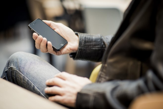 Online banking. Man with cellphone. Photo